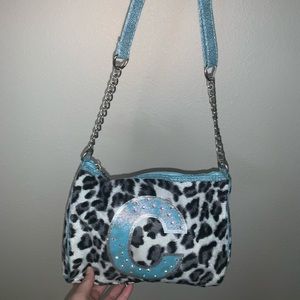Leopard print C cross body bag